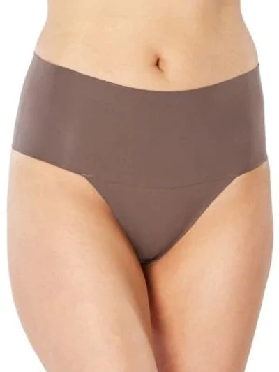 Shop Spanx Undie-tectable Shaping Thong In Umber Ash