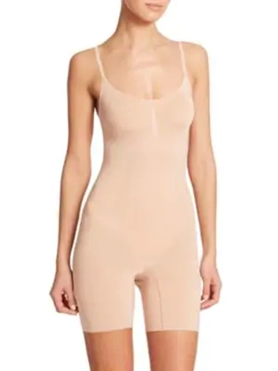 Shop Spanx Oncore Mid-thigh Bodysuit In Soft Nude