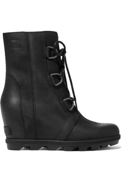 Shop Sorel Joan Of Arctic Wedge Ii Waterproof Leather And Rubber Ankle Boots In Black