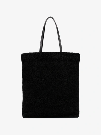 Shop Saint Laurent Black Shearling Tote Bag