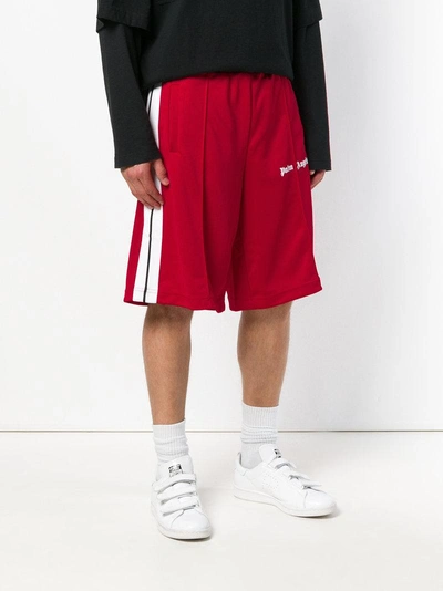 Shop Palm Angels Contrasting Logo Shorts - Red