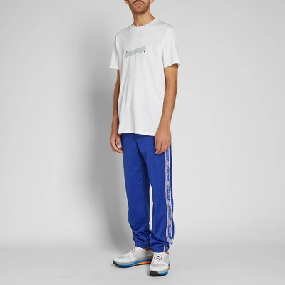 Shop Givenchy Taped Track Pants In Blue
