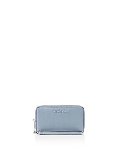 Shop Michael Michael Kors Multi-function Flat Large Smartphone Wristlet In Pale Blue/silver