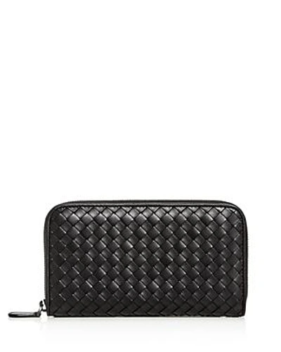 Shop Bottega Veneta Woven Leather Zip Wallet In Black