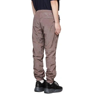 Shop Stone Island Pink Logo Badge Track Pants In V0086 Rose