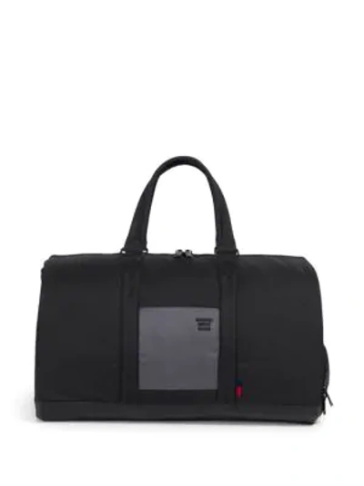 Shop Herschel Supply Co Novel Polycoat Duffel Bag In Black