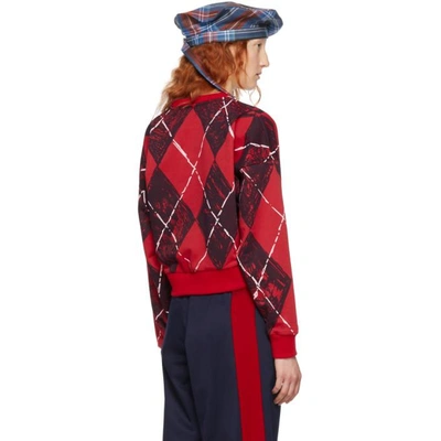 Shop Charles Jeffrey Loverboy Red And Black Claes Argyle Crewneck Sweater In Red/black