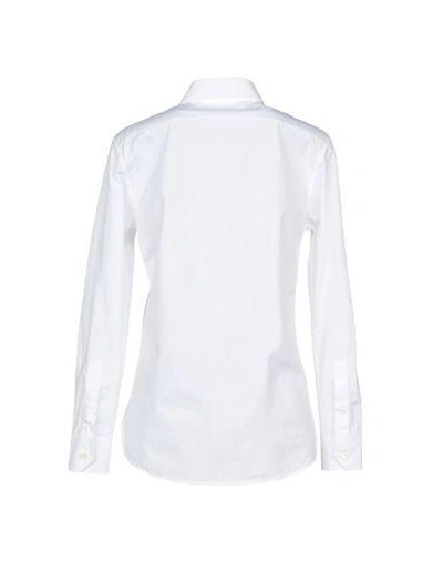 Shop Saint Laurent Solid Color Shirts & Blouses In White