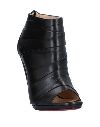 Shop Christian Louboutin Ankle Boots In Black