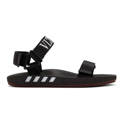 Shop Valentino Black  Garavani Vltn Sandals In 0ni Black