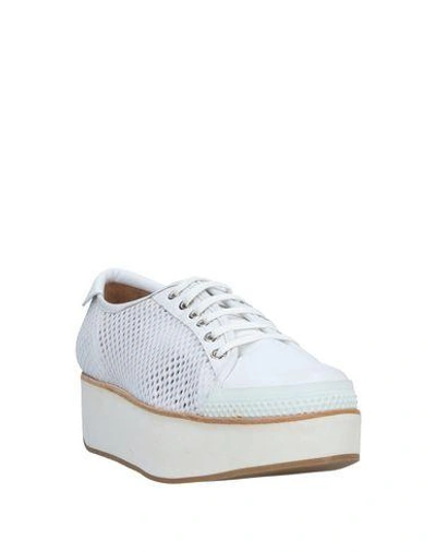 Shop Flamingos Sneakers In White