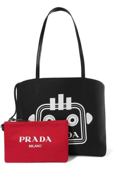 Shop Prada Printed Canvas Tote In Black