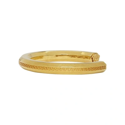 Shop Versace Gold Cuff Bracelet In Kot Gold