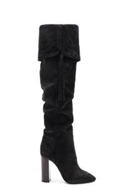 Shop Saint Laurent Suede Meurice Tassel Slouchy Boots In Black.