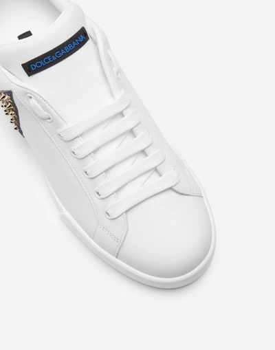 Shop Dolce & Gabbana Portofino Sneakers With Patch In White