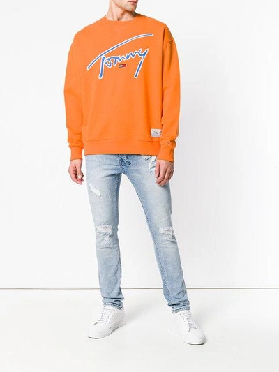 Shop Tommy Jeans Embroidered Logo Sweatshirt In Yellow & Orange