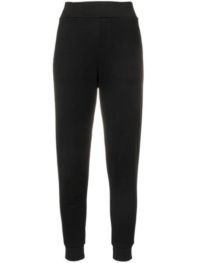 Shop Moncler Tapered Track Pants In Black
