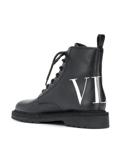 Shop Valentino Garavani Vltn Combat Boots