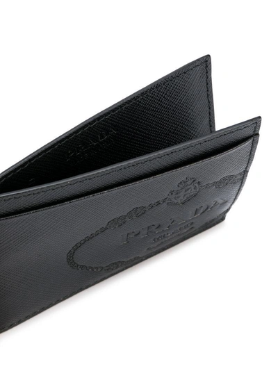Shop Prada Logo Embossed Saffiano Card Holder - Black
