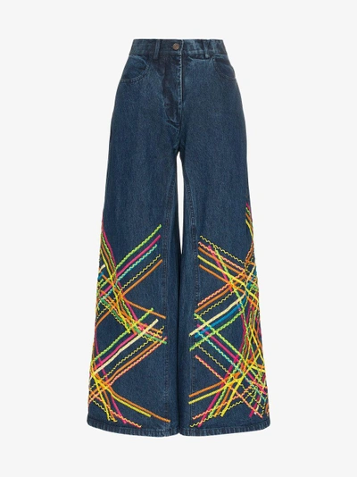 Shop All Things Mochi Brianna Embroidered Flared Jeans In Blue