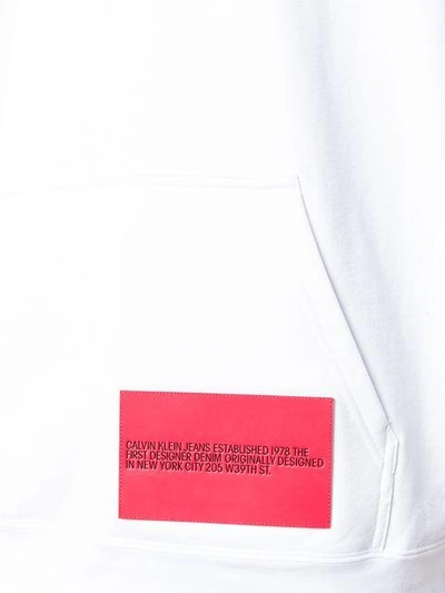 Shop Calvin Klein Jeans Est.1978 Modernist Eagle Logo Hoodie In White