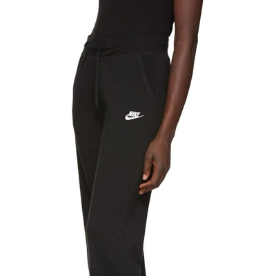 Shop Nike Black Nsw Fleece Loose Lounge Pants In 010 Black