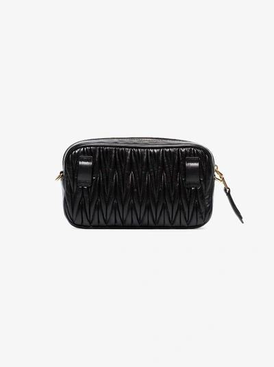 Shop Miu Miu Matelassé Leather Belt Bag In Black