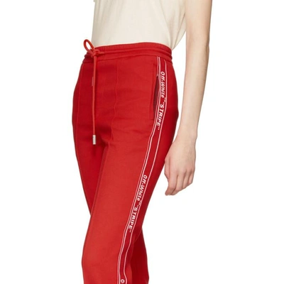 Shop Off-white Red Logo Tape Track Pants