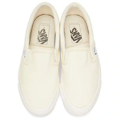 Shop Vans White Og Classic Slip-on Sneakers In Off White