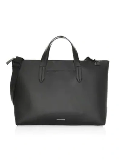 Shop Uri Minkoff Devin Leather Zip-top Tote Bag In Black