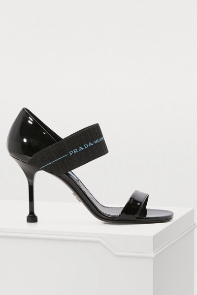 Shop Prada Patent Leather Sandals In Black