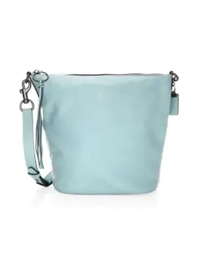 Shop Coach Pebble Leather Duffle Bag In Turquoise