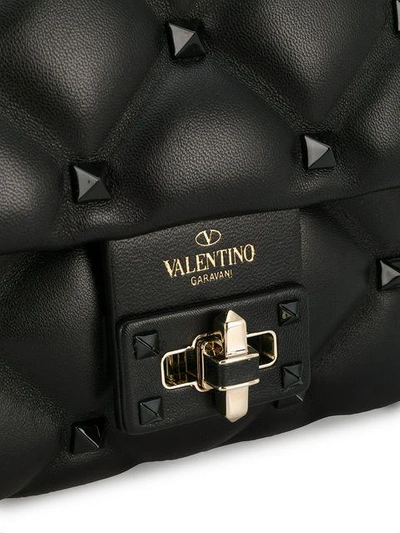 Shop Valentino Garavani Rock Studs Cross Body Bag - Black