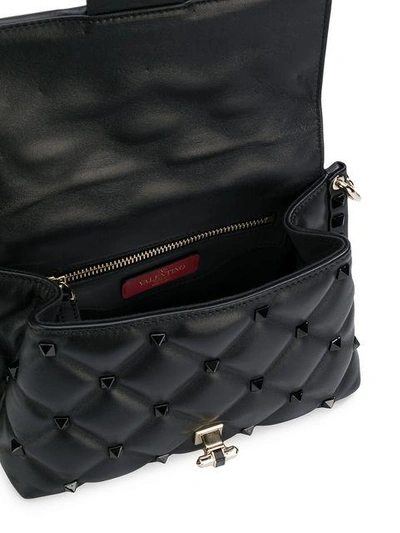 Shop Valentino Garavani Rock Studs Cross Body Bag - Black