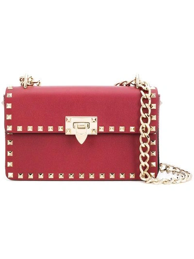 Shop Valentino Garavani Rockstud Shoulder Bag In Red