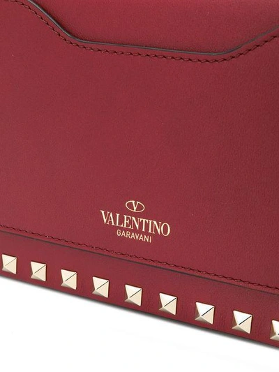 Shop Valentino Garavani Rockstud Shoulder Bag In Red