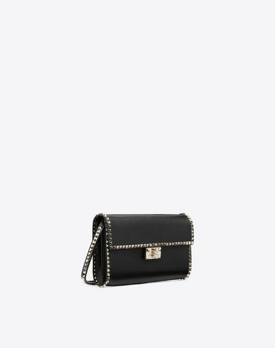 Shop Valentino Rockstud No Limit Clutch In Poudre