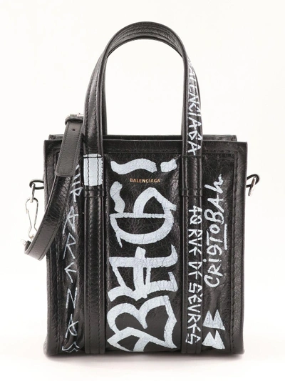 Shop Balenciaga Black Graffiti Bazar Xxs Bag In Black/white