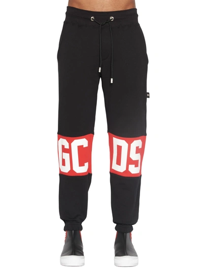 Shop Gcds Pants In Black