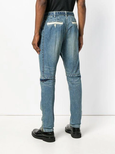 Shop Sacai Distressed Knee Rip Jeans In Blue
