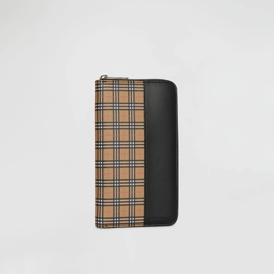 Shop Burberry Small Scale Check And Leather Ziparound Wallet In Antique Yellow/black