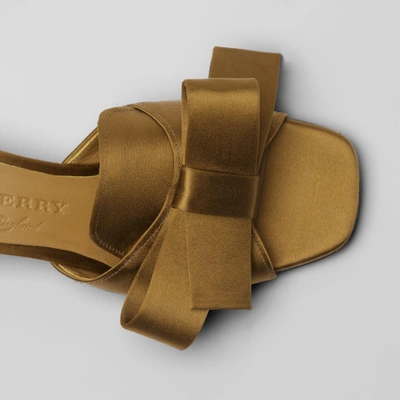 Shop Burberry Bow Detail Satin Block-heel Mules In Antique Gold