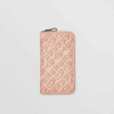 Shop Burberry Perforated Leather Ziparound Wallet In Pale Fawn Pink