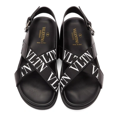 Shop Valentino Black  Garavani Strap Logo Sandals In 0no Black