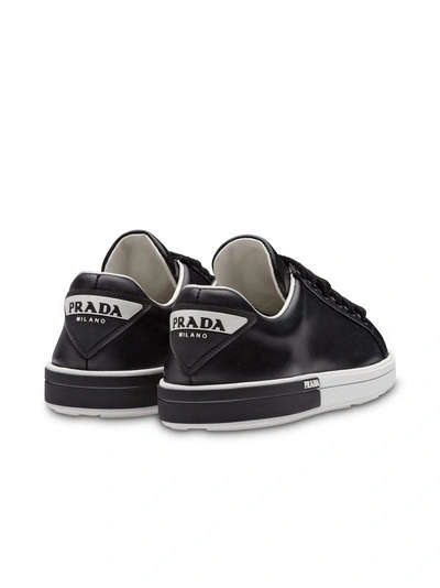 Shop Prada Logo Plaque Sneakers In Black