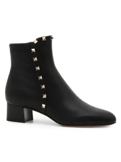 Shop Valentino Leather Rockstud Booties In Black