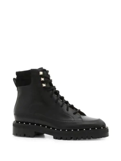 Shop Valentino Leather Rockstud Combat Boots In Black