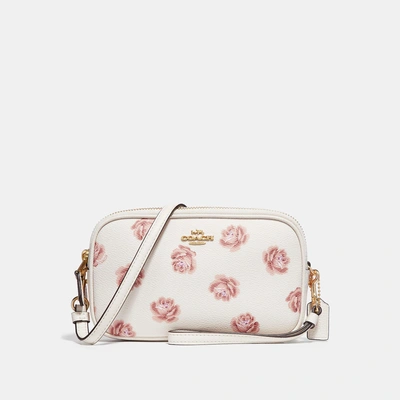 Shop Coach Sadie Crossbody Clutch With Rose Print In Chalk Rose Print/light Gold