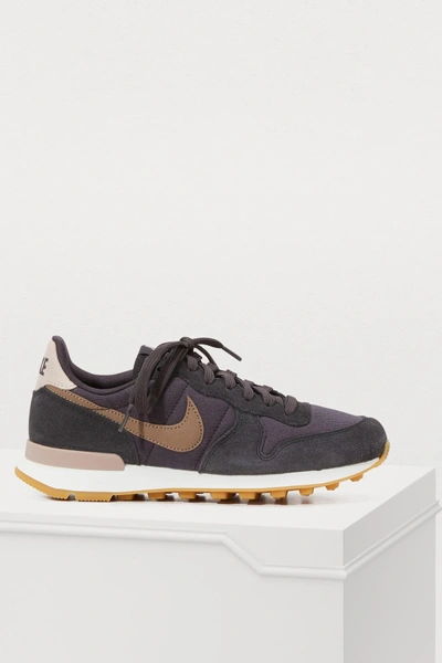 Shop Nike Internationalist Sneakers In Oil Grey/mink Brown-summit White