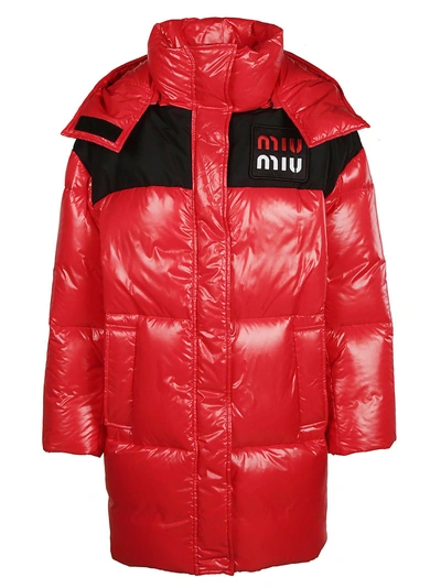 Shop Miu Miu Oversized Padded Jacket In Rosso
